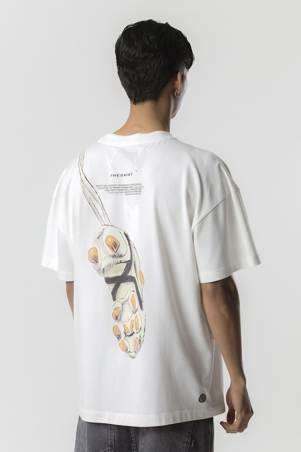 Camiseta TheSaint Oversized Cleats (Off White)